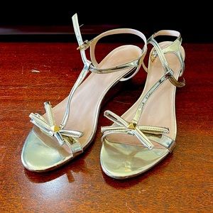 Kate Spade gold t-strap bow heels